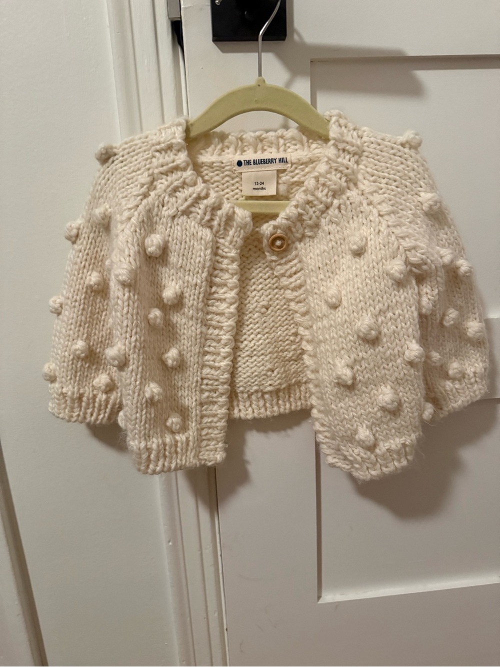 The Blueberry Hill Cream Pom-Pom Knit Cardigan for Babies